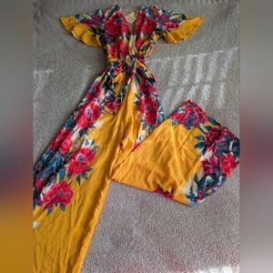 Flying Tomato Yellow Jumpsuit with Red and Green Floral Design